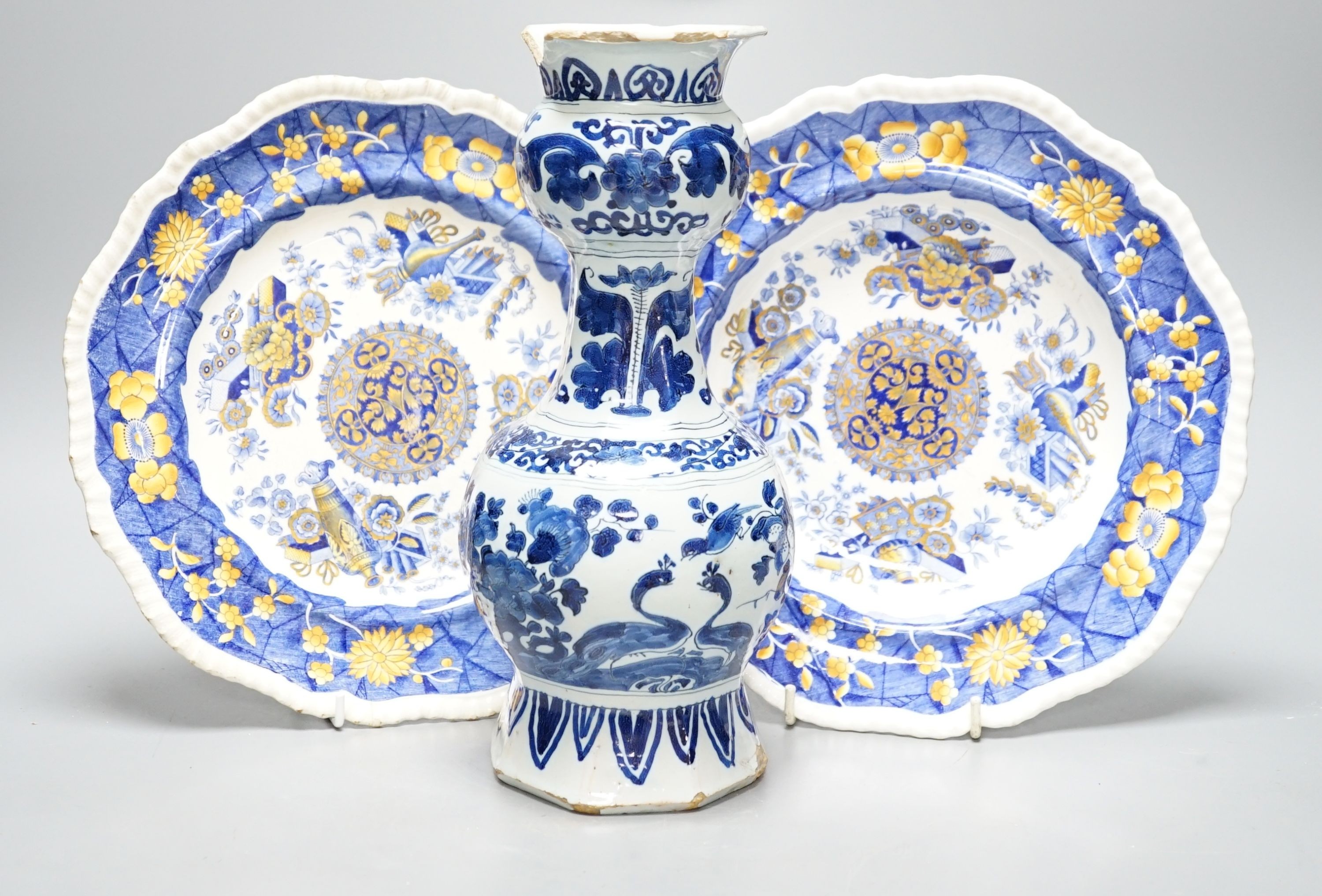 An 18th century Deflt vase and two early 19th century Spode pottery dishes, vase 24 cms high